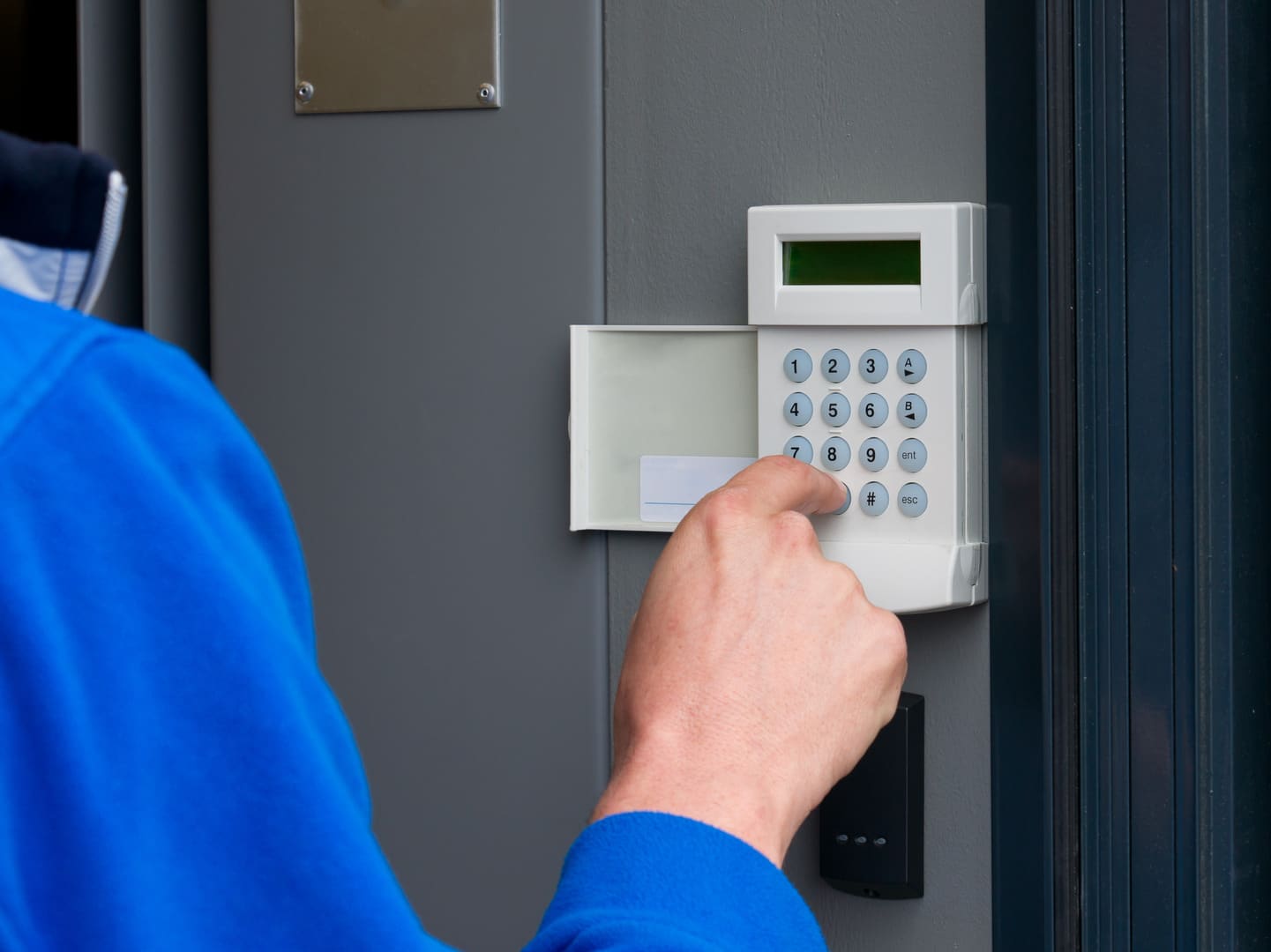 Commercial intrusion alarm panel and wiring installed at a Minnesota business