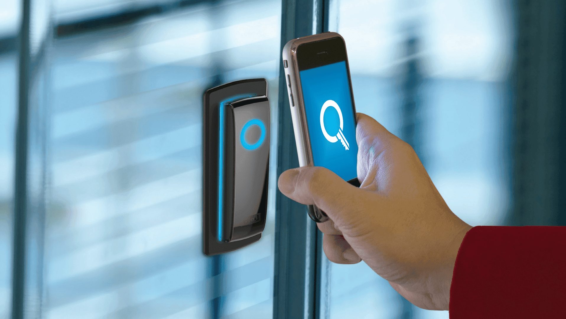 Modern electronic access control reader at a commercial entrance